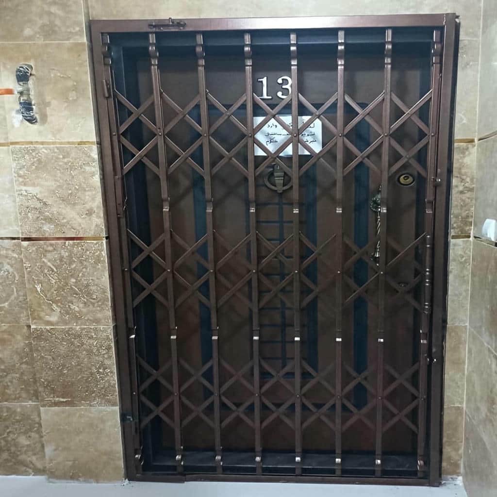 خرید درب آکاردئونی تسمه پهن آهنی متناسب با ورودی در بندر عباس
